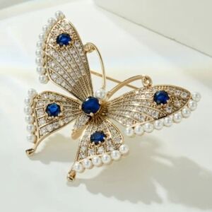 Elegant Gold Butterfly Brooch with Blue Accents